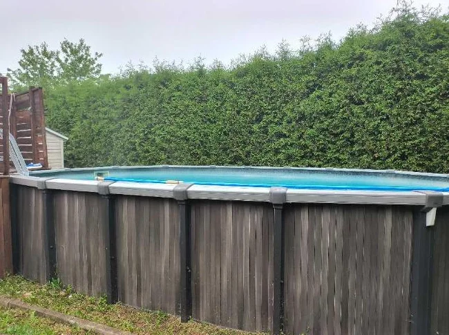 Piscine hors terre Trévi Pulsar ovale 15’ x 24’ x 52 ’’, année 2018