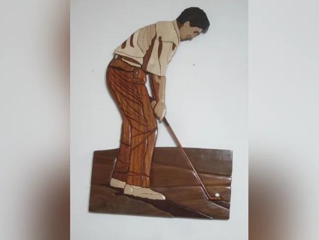 Artisanat Joueur de golf en bois exotique