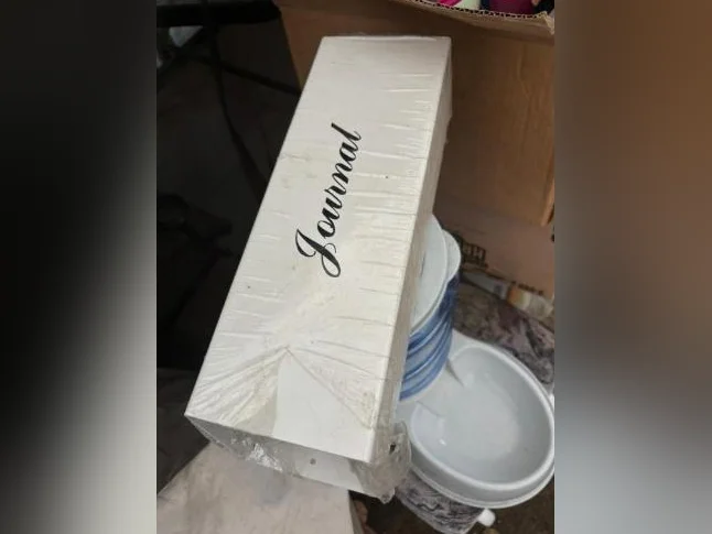 Boîtier pour la livraison du journal