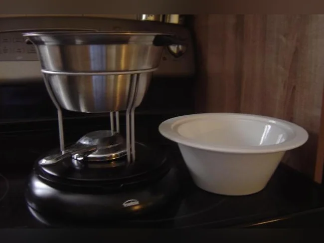 ensemble fondu trudeau neuf pas electric +OUVRE BOUTEILLE