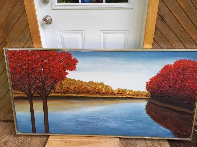 Grande peinture, arbres rouges et riviere.