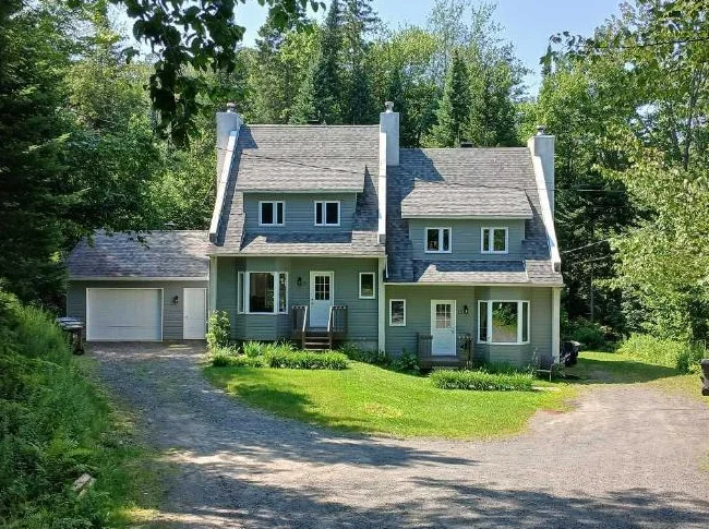 DUPLEX AVEC GARAGE A VENDRE A SAINT_ SAUVEUR