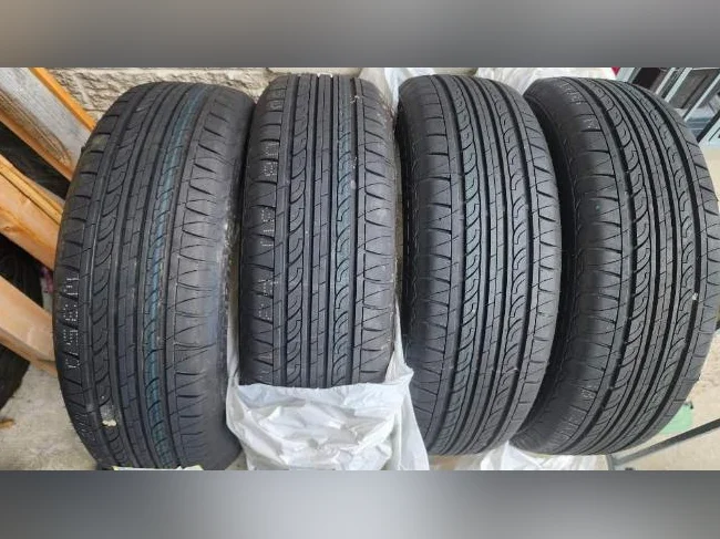 4 Pneus été P185/60/r15 (NEUFS)