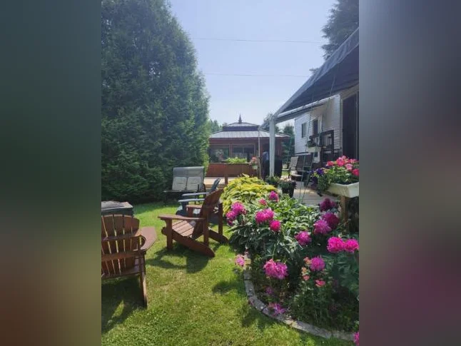 Roulotte Satellite CF3910 2018 + cabanon+gazebo + BBQ Coleman+foyer sur son site clé en main thumbnail 3