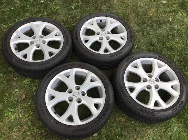4x Mazda 17” mag 5x114.3 + 205/50R17 All season performance tire thumbnail 3