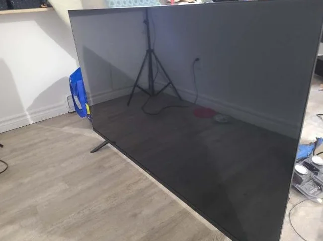 Tv ultra HD 55'' avec télécommande