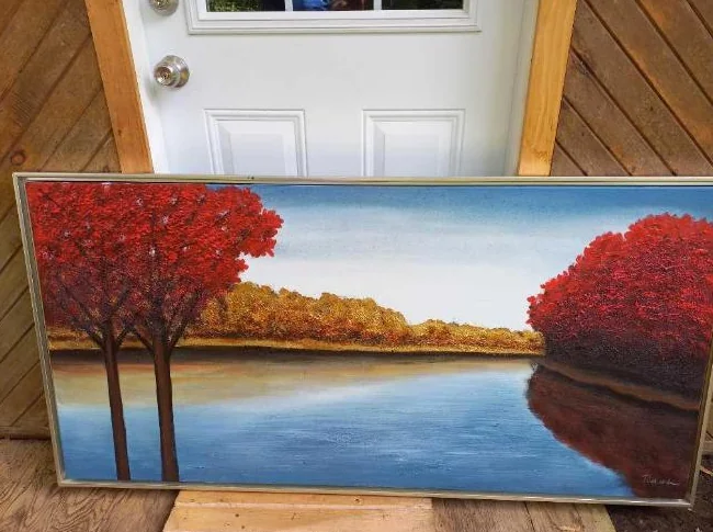 Grande peinture, arbres rouges et riviere.