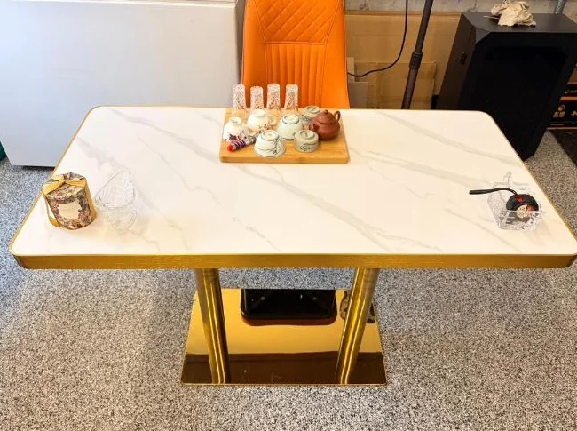 24x48 dining table, sinter stone top with steel base. $340