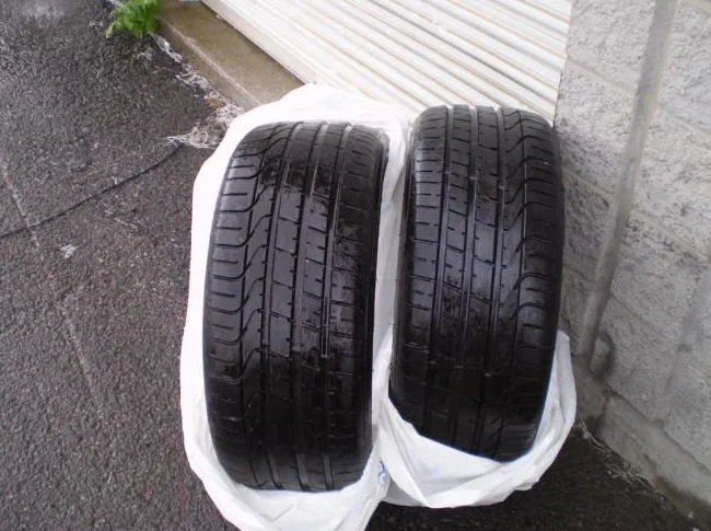 2 pneus été p-255-35-r-20 pirelli pzéro,(9.5/32).$100.00..