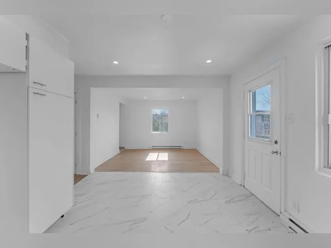 Grand 7½ rénové | 3 chambres | 2 salles de bain | Secteur calme thumbnail 2